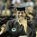 Eastern Michigan graduate Kathleen Simcox, reacts to a special surprise of her brother, U.S. Army Sergeant Ben Simcox, appearing on stage after she was lead to believe he wouldn't be able to make it to her graduation, as he was stationed in Germany, at the Convocation Center in Ypsilanti, on Sunday, April 29, 2012. For annarbor.com By: Joe Sharp